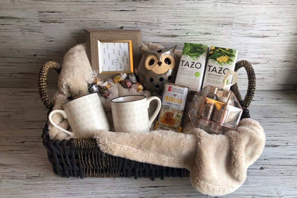 A basket of coffee and tea with an owl.