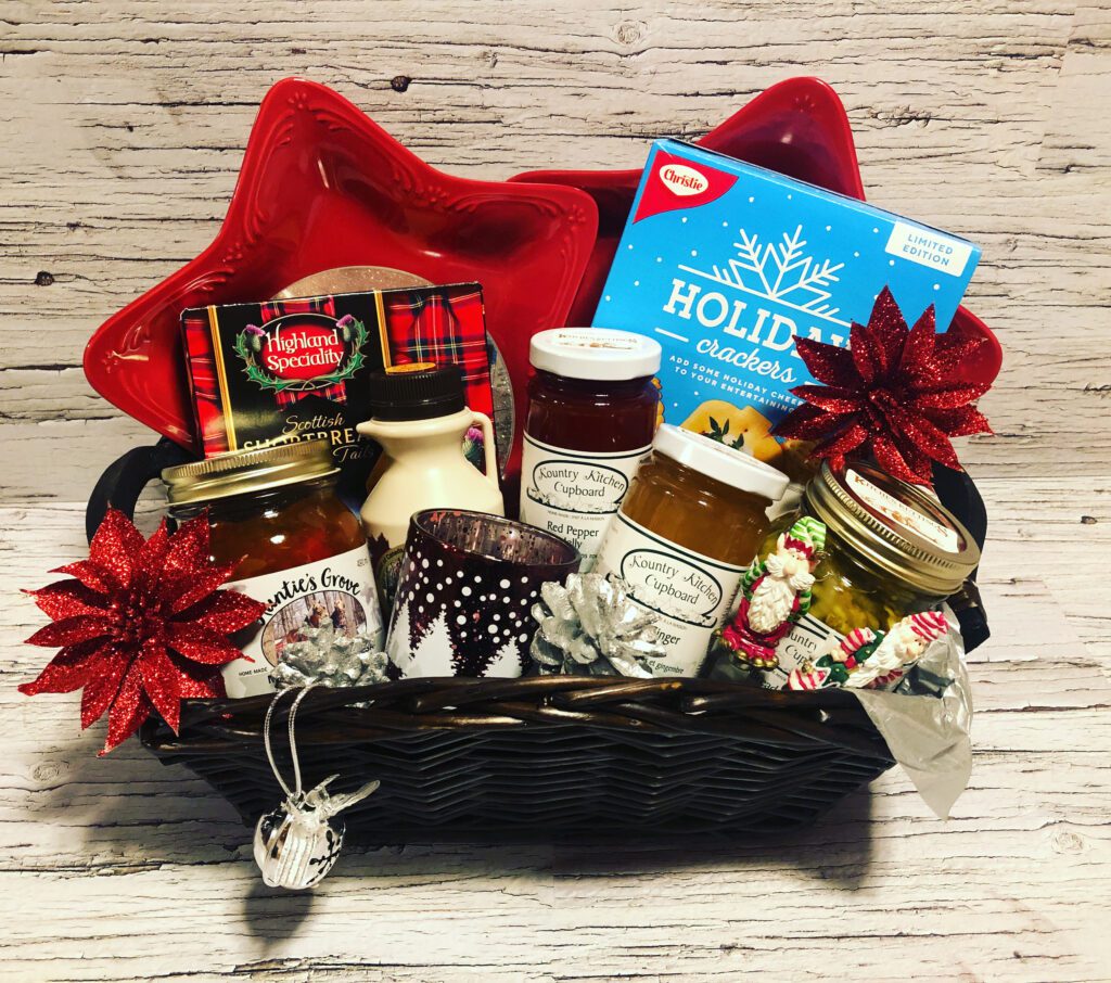 A basket of food and other items on top of a table.