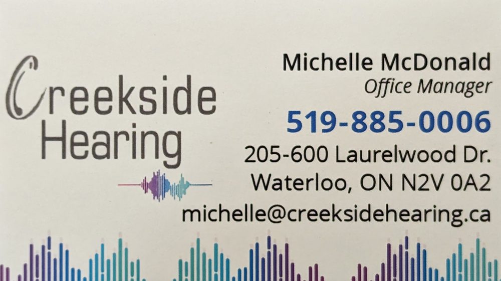 A business card for creekside flooring.