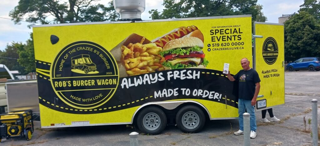 A food truck with the words " always fresh made to order ".