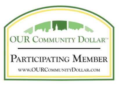 A picture of the our community dollar logo.