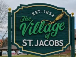 A sign for the village of st. Jacobs